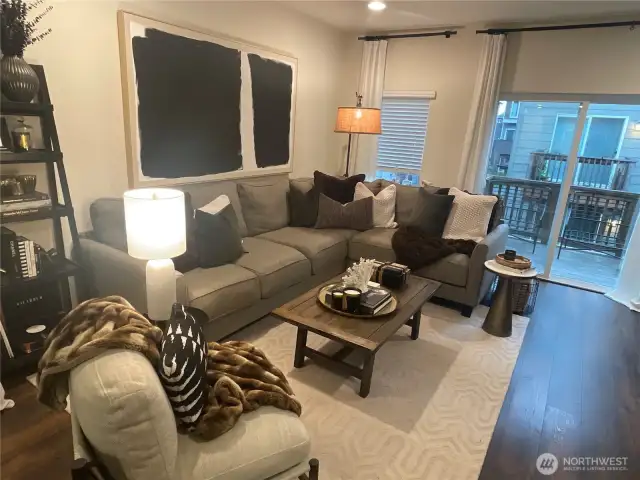 Living room with view of back deck.