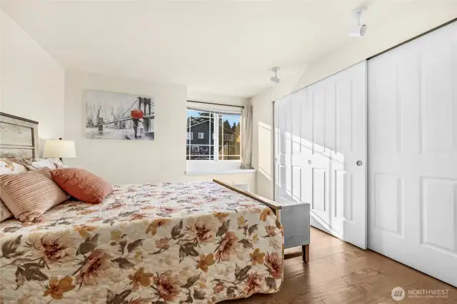 2nd floor Bed #2 with wall of closets and window seat