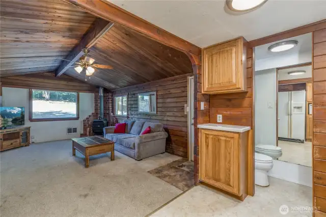 From kitchen - looking toward living room and second bath