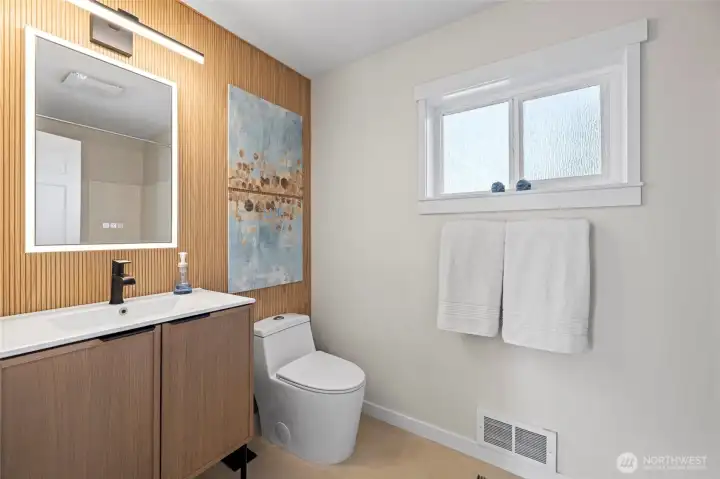 Large format Hex tile, slim shaker white oak vanity, full tub/shower