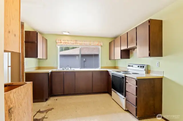 Large kitchen with great potential.