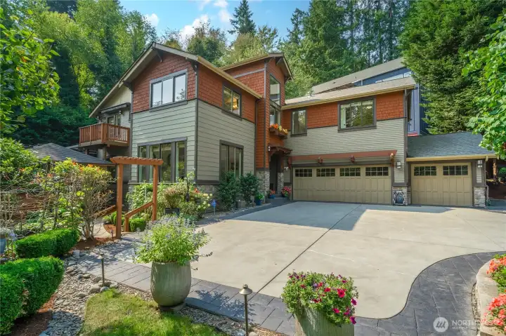 Nestled on a 0.66-acre lot in Bellevue’s coveted Robinswood neighborhood