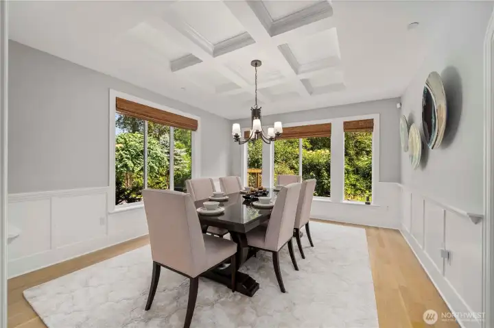 Rich hardwood floors, formal dining with architectural detail