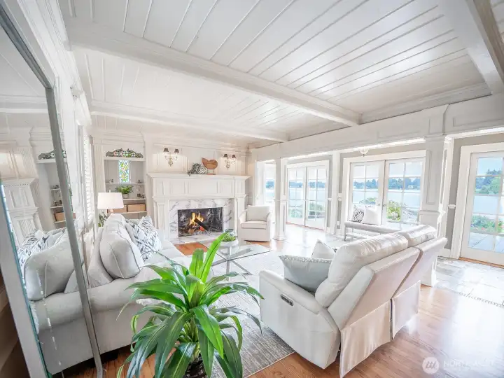 A massive wood burning fireplace and gorgeous mantle.