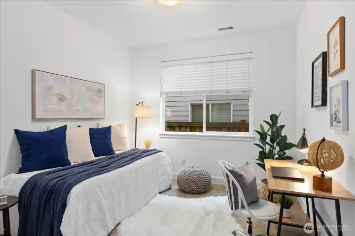 Main level versatile room - bedroom or flex space with added bonus of 3/4 bath across the hall!