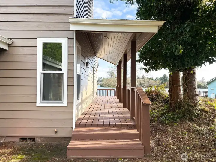 Covered front entry attached to the back deck