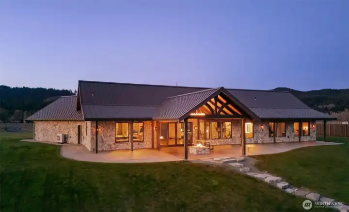 Beautiful Evenings under the heated BBQ patio. Gaze at the serene Lake over flames dancing in the firepit.