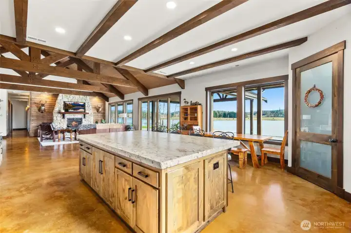 Massive prep space and eating bar. Ample walk in pantry storage