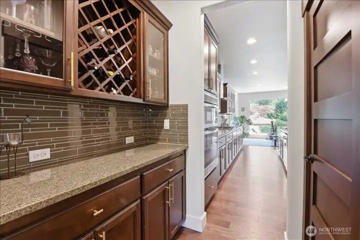 Butlers pantry, featuring a walk in pantry to the right
