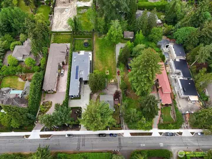 With variance, Medina should allow for a similar footprint and setbacks to the homes to the west of this property. This lot would have a flat backyard.