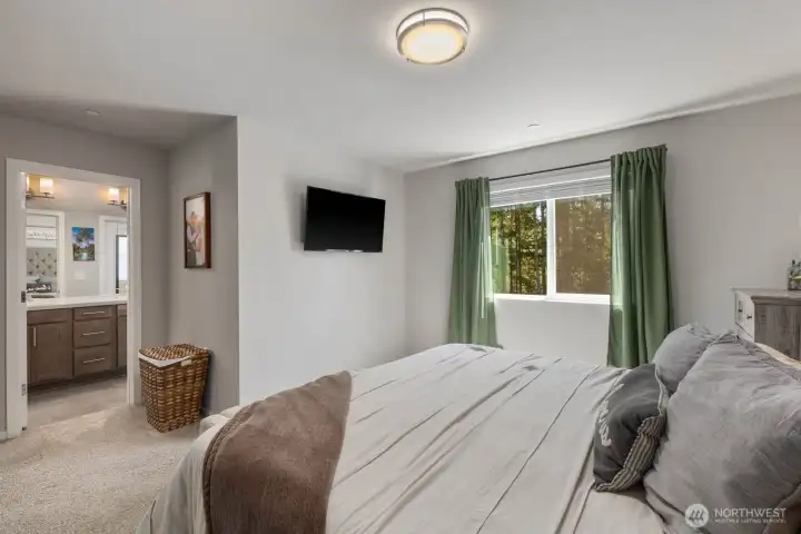 Additional bedroom view showcasing the room's layout and adjoining bathroom access.