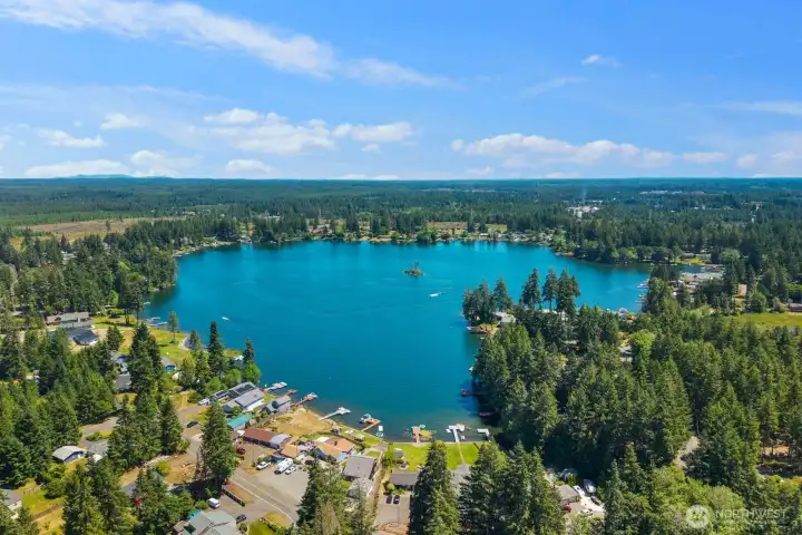 Aerial view of a nearby lake and surrounding area.