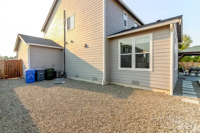 Huge side yard for garden boxes and planters if you want!