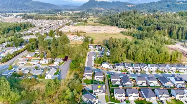 Look for the star... North boundary of property lines up to a greenbelt.. really opens up the upstairs views.