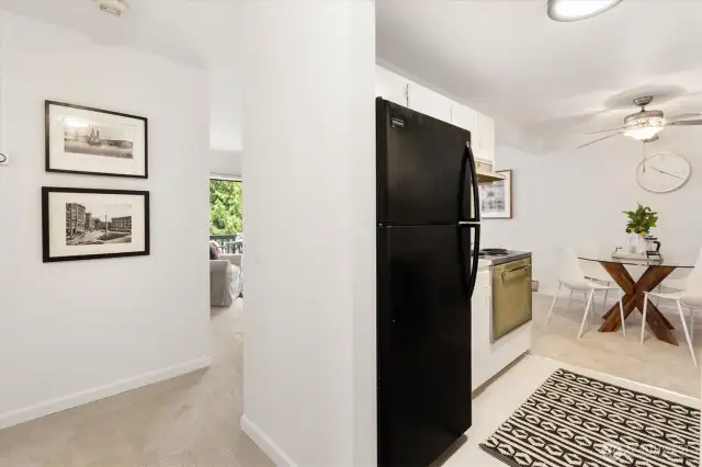 Entry/hallway shows the easy flow throughout this condo. Freshly painted as well as new carpet. The seller took care of some of things to make it move-in ready.