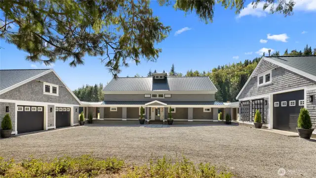 Front exterior with both garages