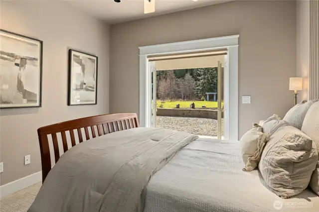 primary bedroom has french doors opening to backyard