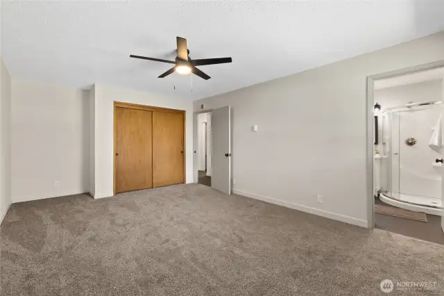 The primary suite is super spacious and has a fully renovated en suite bath