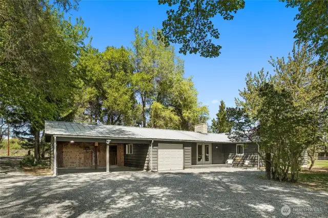 Attached garage and double carport - plus the wind protected back patio!