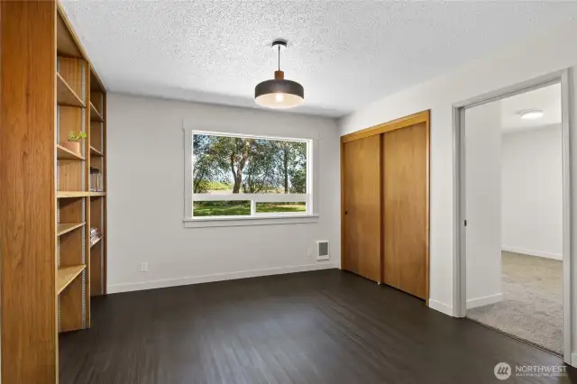 Dining area, with built in bookshelves, and a view to the north