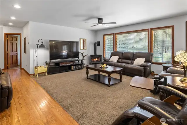 Nice sized living space with a bank of windows! Propane free standing stove keeps you toasty when it's snowing out. This cabin is TURN KEY which means you get to keep the 75" flatscreen too!