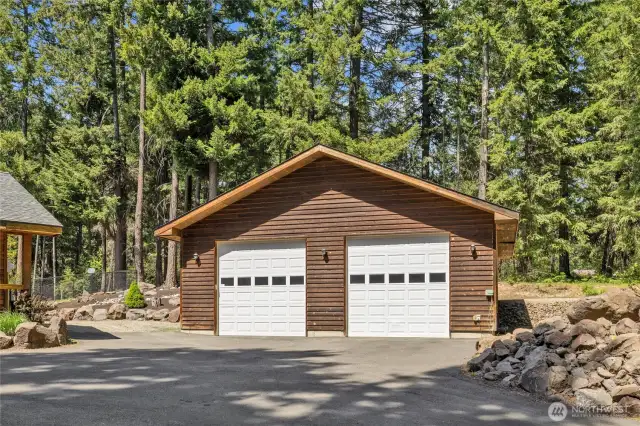 Detached garage! Large enough for probably 3 cars or lots or snowmobiles, maybe your boat? You are minutes to Lake Cle Elum. Fully finished inside with electric doors & efficient storage racks.