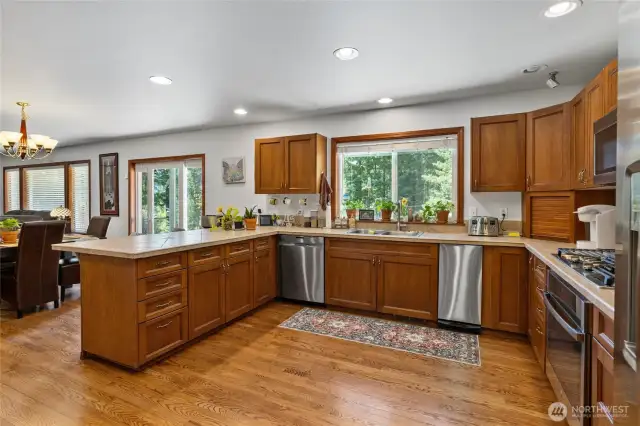 Nice double sink, Propane stove, views into your peaceful back yard.