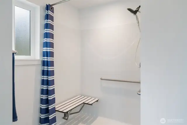 Easily accessible walk in shower in the primary bath.
