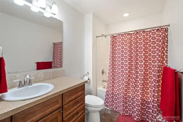 Main bath off of hallway.