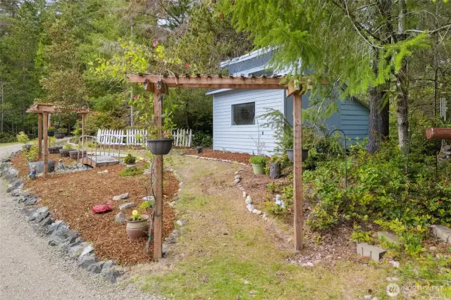 The well house/garden shed. Lots of natural light and could be used as a potting room.