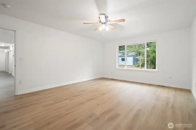 Primary bedroom with walk in closet, and private ensuite.