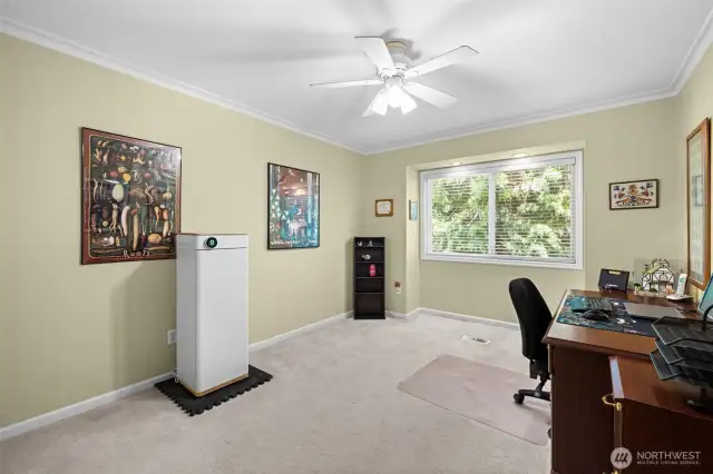 Bedroom being used as craft room/office space.
