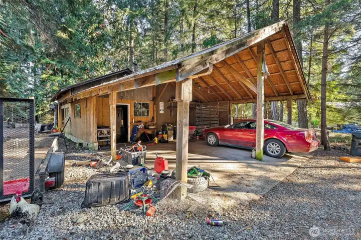 Extra large carport leads to the shop