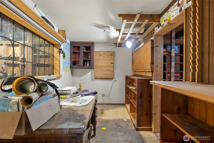 Office inside shop, don't miss the cool porthole window in the door!