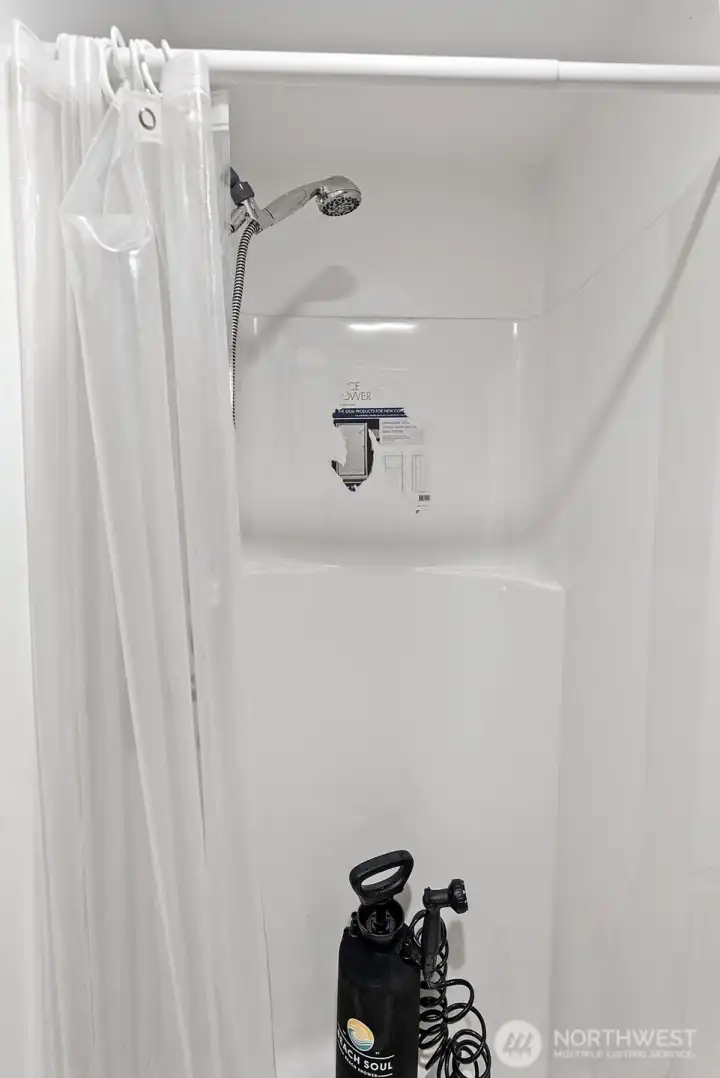 Stall shower using water storage system