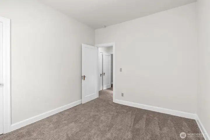 Upper level bedroom (one of three).