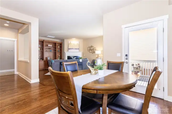Open concept continues with the breakfast nook leading into the cozy family room. Great layout for hosting, connecting kitchen, dining, and living spaces with flow and warmth.