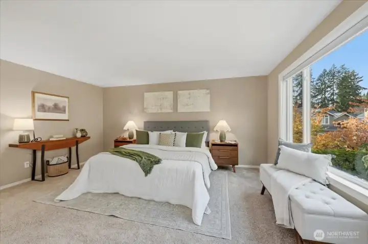 Large Primary bedroom offers being located in the back of home taking advantage of views of the back yard oasis, 5-piece updated ensuite, walk-in closet!  Quite the peaceful retreat!