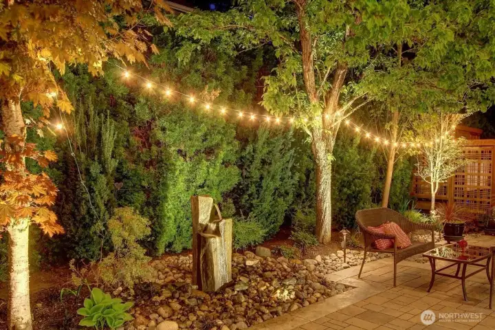 Charm & character just continues on!  Pictured here is back yard water feature adding the beautiful sound of cascading waterfall!  WELCOME HOME!