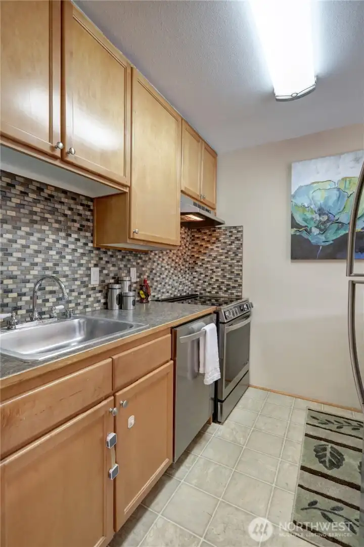 All new stove/oven-fridge to the right