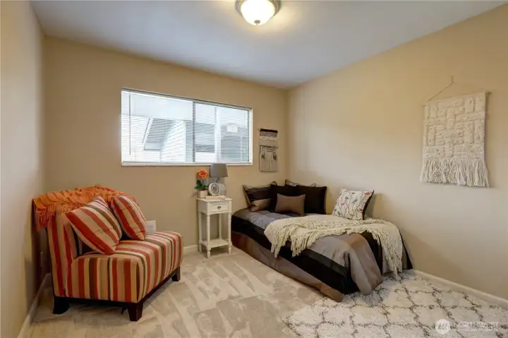 bedroom  # 2 w/new dbld. pane windows- virtual stage