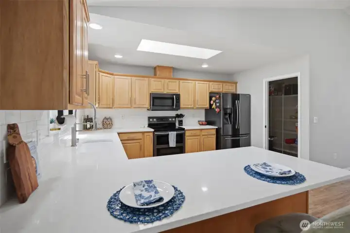 plenty of counter space + walk in pantry