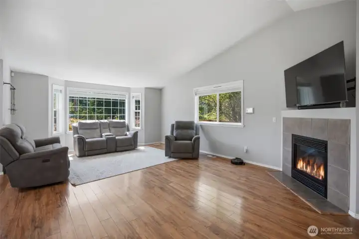 cozy fireplace and lots of natural light