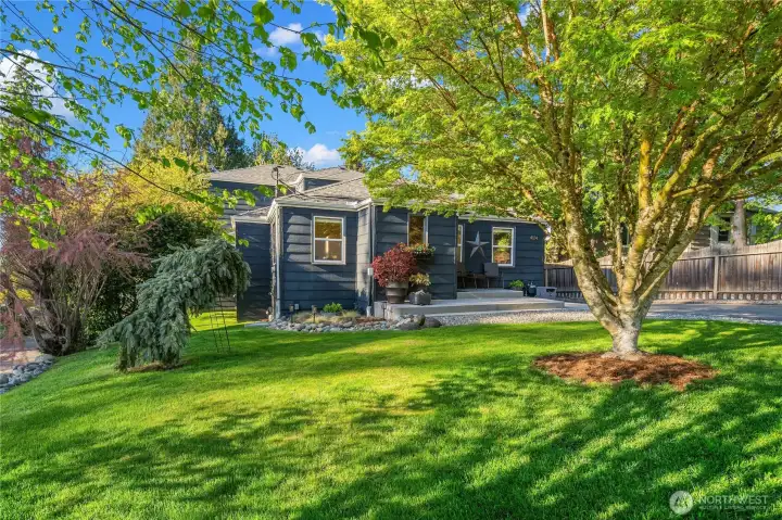 Nice landscaping and yard space front and back.