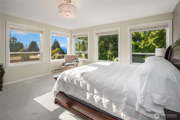 Primary bedroom has a Puget Sound view.
