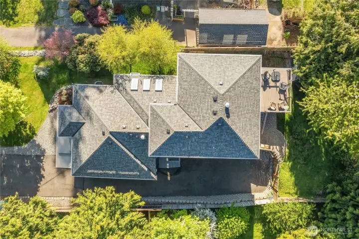 Very large house with driveway down the side to rear yard.