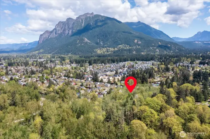 Imagine living in a custom-built home where stunning views of Mt. Si are part of your everyday experience