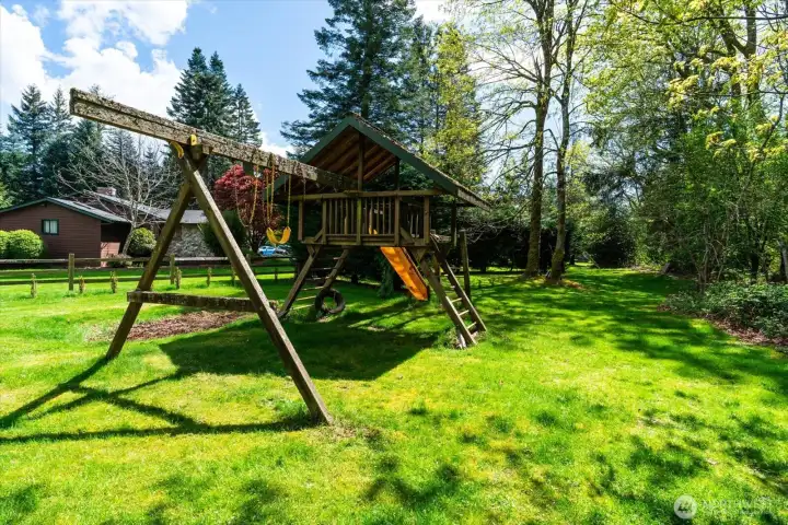 A third, level potential building site with access existing neighborhood on South Side from a County Access Road. Crossing the creak would not be necessary fro this potential building site.
