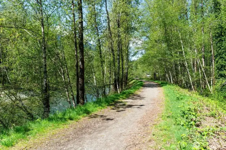 South Fork Levee trail runs along the West property line with beautiful South Fork Snoqualmie river and Mount Si Views