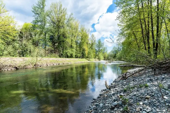 Enjoy Fly Fishing or just the calming and picturesque views across the public levee on the North and West side of property